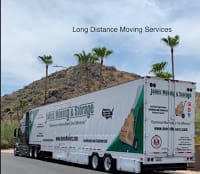 A white Jones Moving and Storage trailer truck