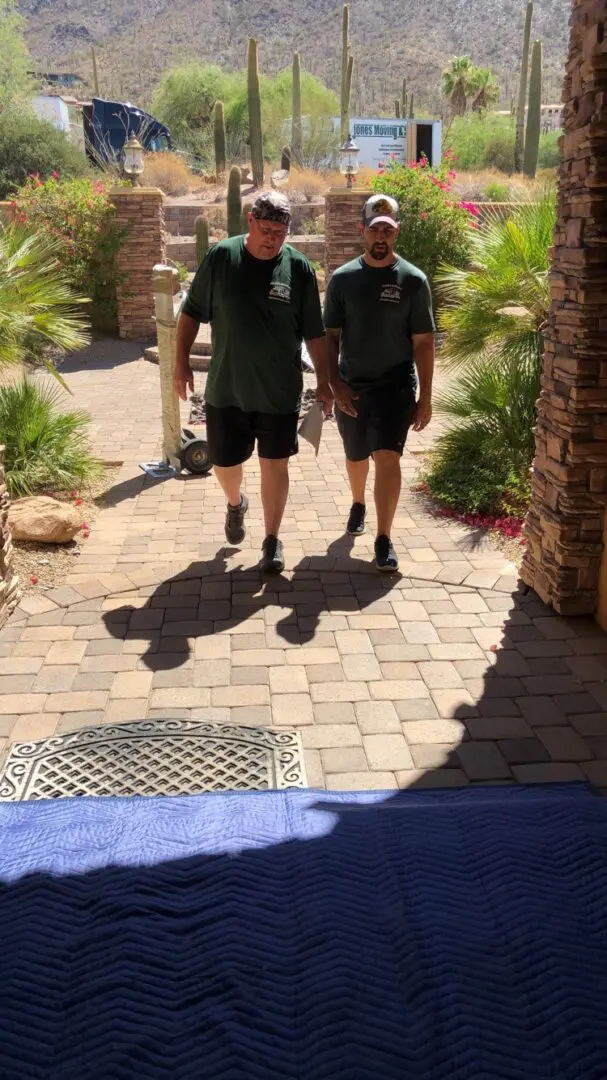 Two movers entering the shade
